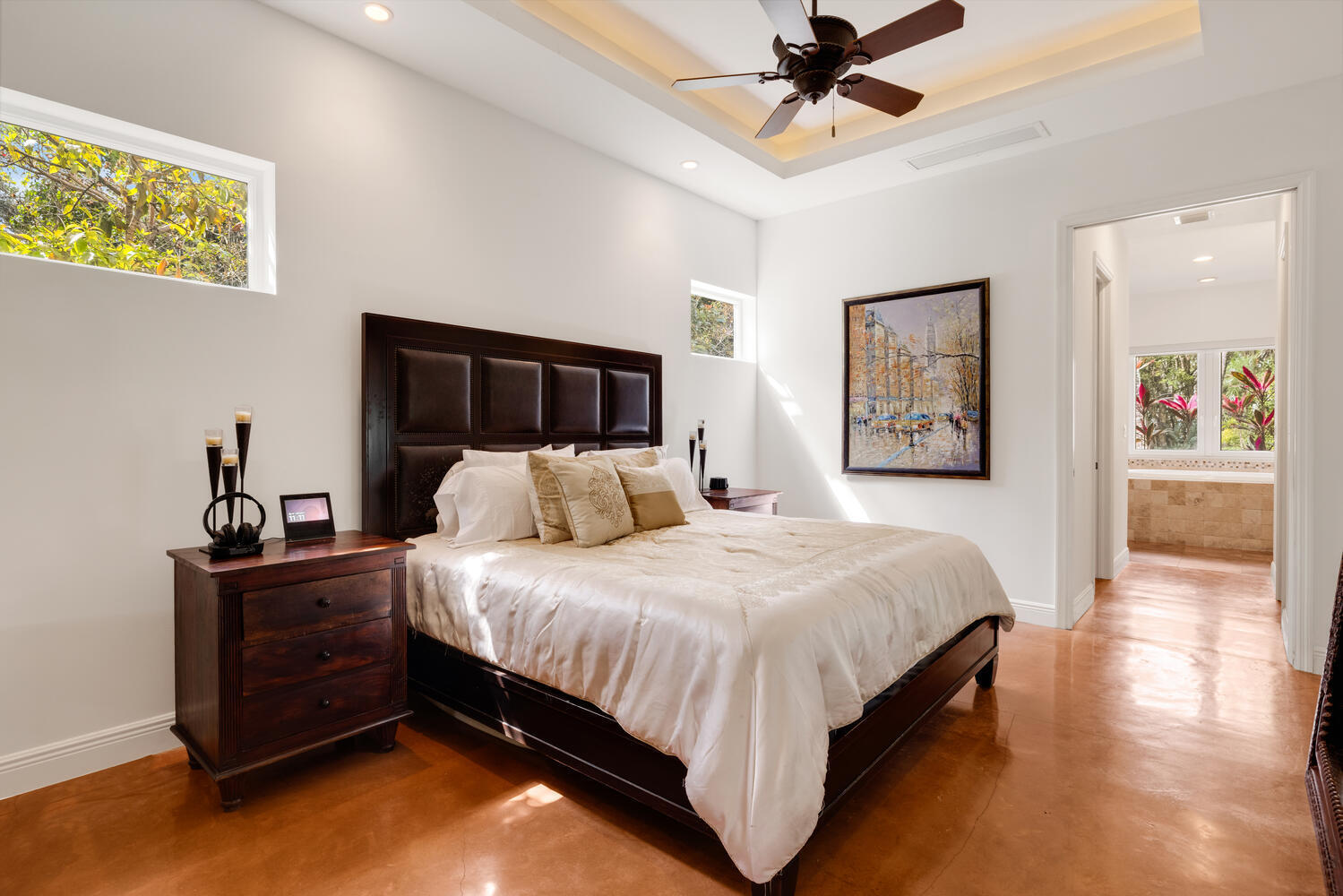 12301 Southwest 107th Avenue Miami, FL 33176 - Photo 26 of 58 a bedroom with a bed and a chandelier
