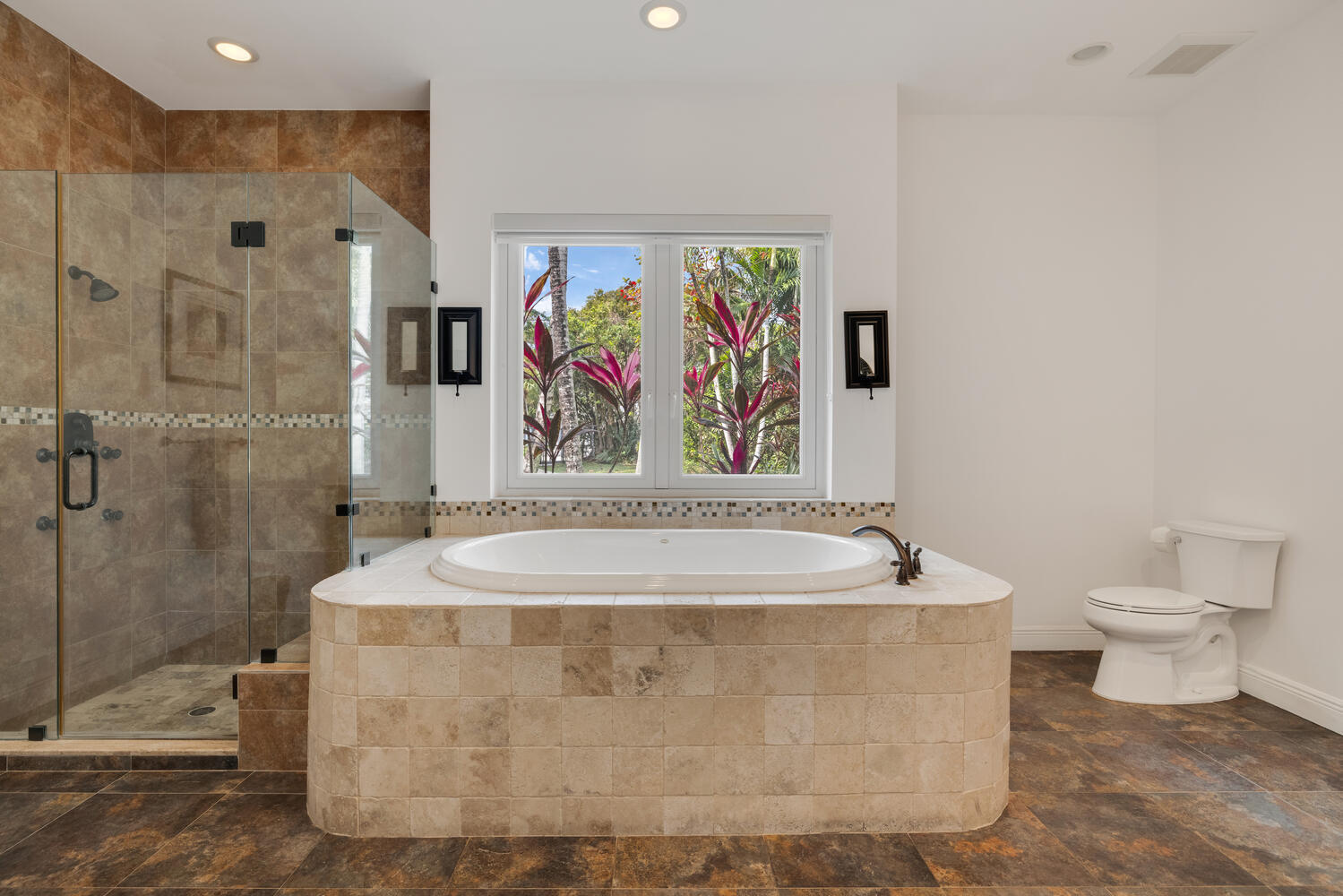 12301 Southwest 107th Avenue Miami, FL 33176 - Photo 28 of 58 a bathroom with a sink a toilet and a shower