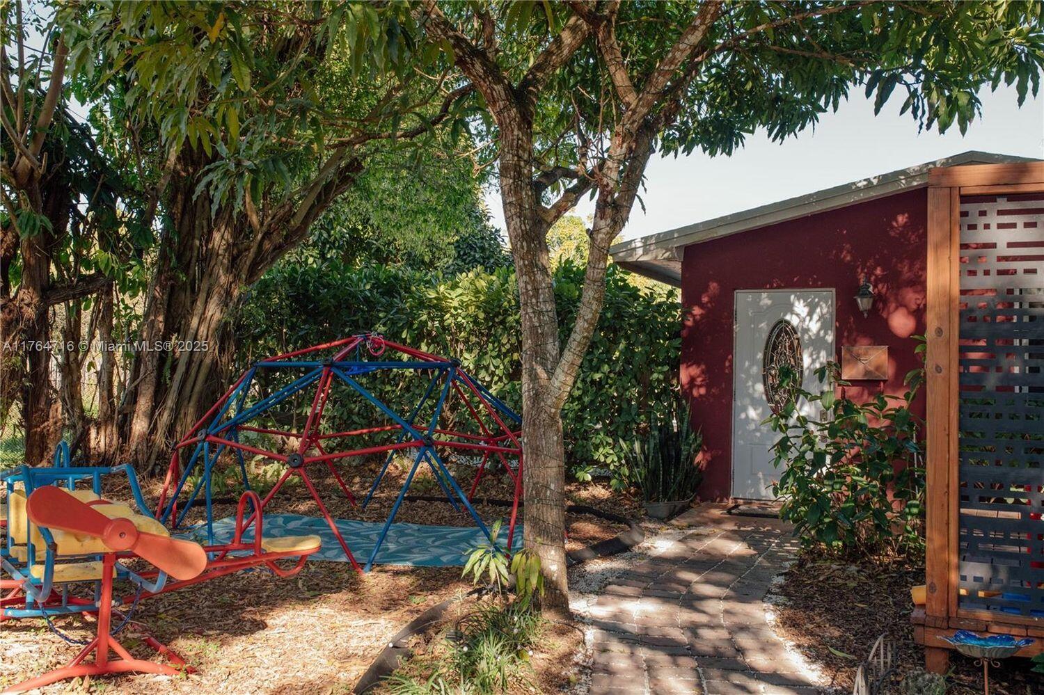 12301 Southwest 107th Avenue Miami, FL 33176 - Photo 44 of 58 a view of a house with a tree