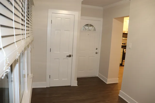 a view of entryway with wooden floor