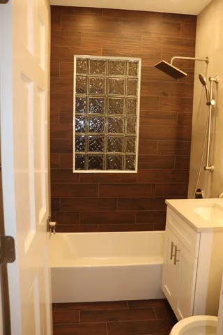 a bathroom with a sink and a bathtub