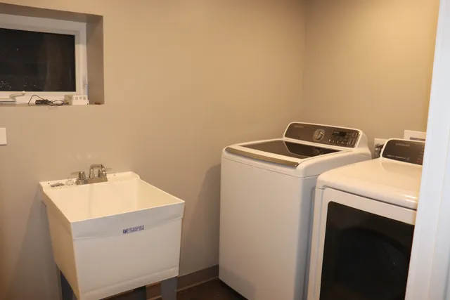 a utility room with dryer and washer