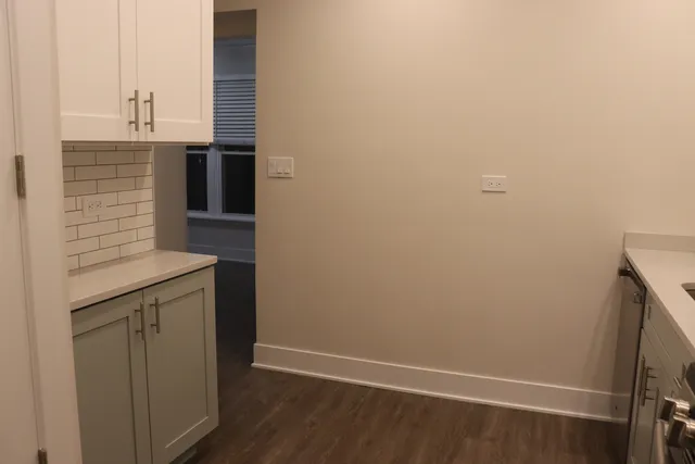 a view of storage and utility room with washer and dryer