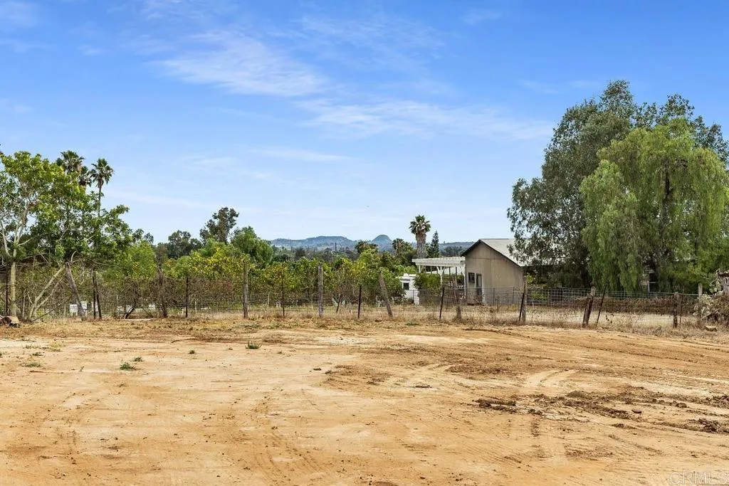Sky Vista Fallbrook, CA 92028 - Photo 9 of 15 a view of a house with a yard