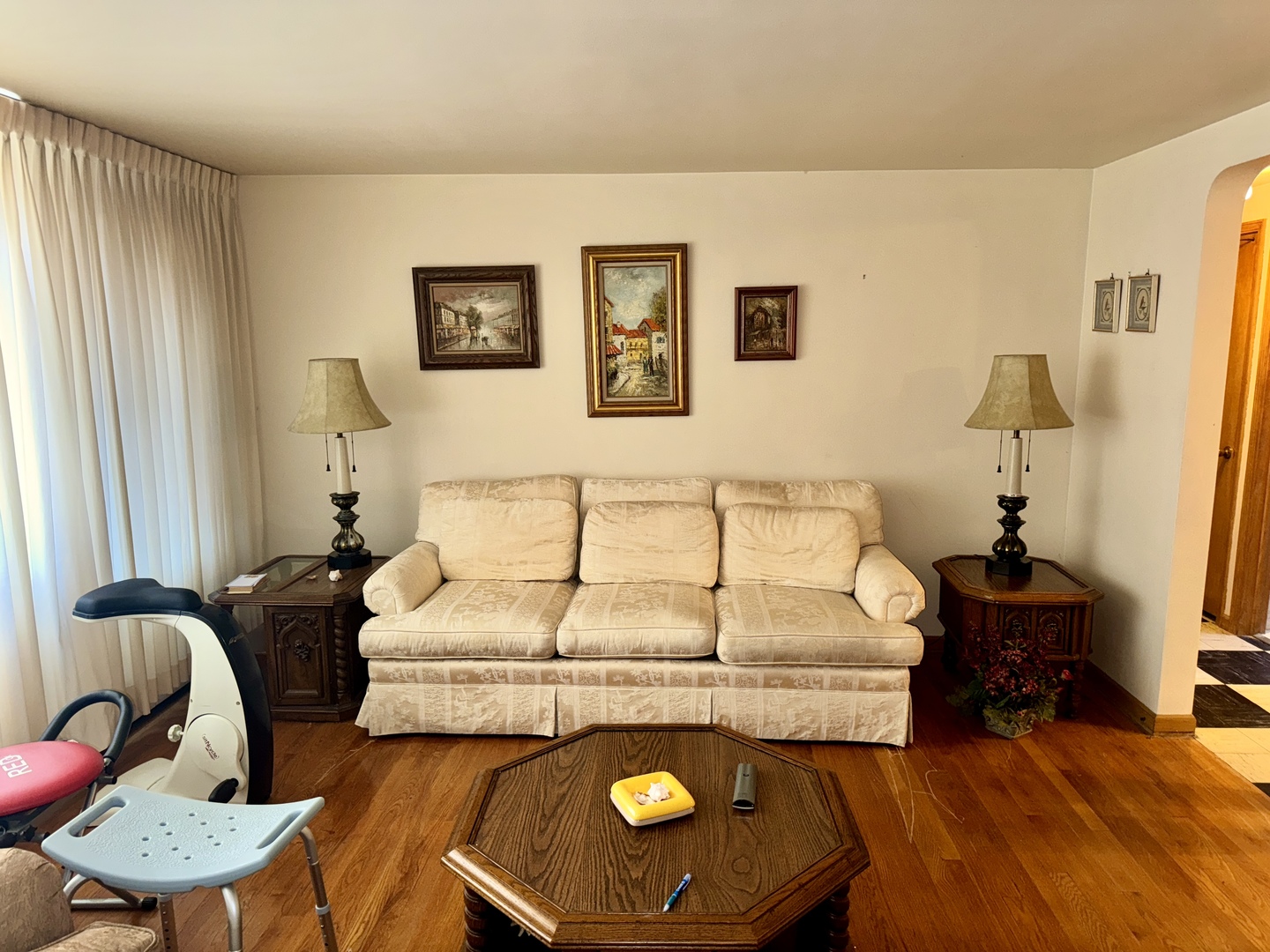 7325 South Kingston Avenue, Unit 2 Chicago, IL 60649 - Photo 3 of 13 a bed room with a bed mirror and a chair