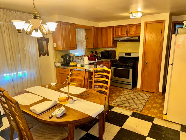 a view of a dining room with furniture