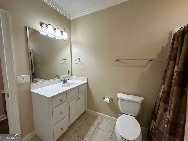 a view of a field of grass and trees