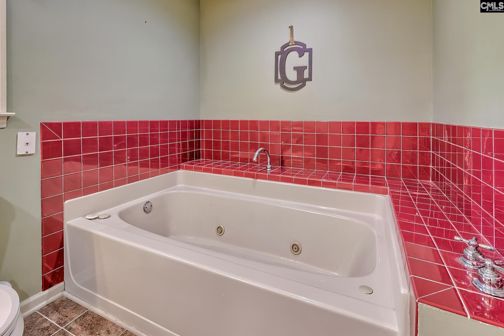 1415 State Rd S-28-55 Lugoff, SC 29078 - Photo 35 of 39 a bathroom with a bathtub