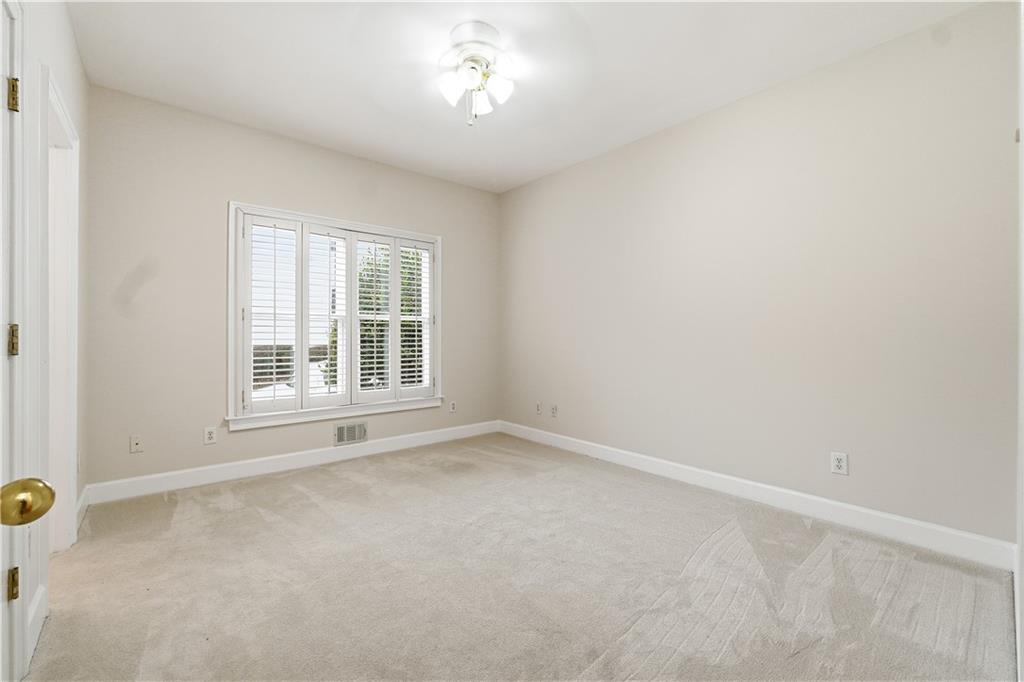 3051 Glenview Lane Monroe, GA 30656 - Photo 18 of 44 an empty room with windows