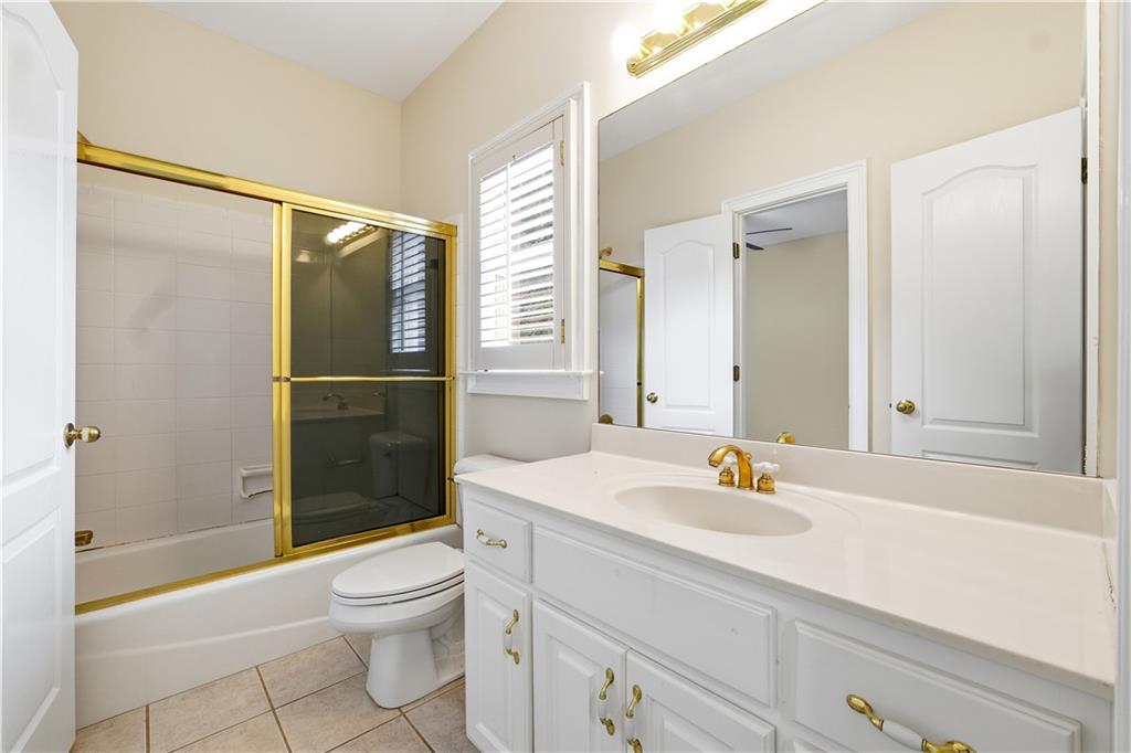3051 Glenview Lane Monroe, GA 30656 - Photo 19 of 44 a bathroom with a sink toilet and shower