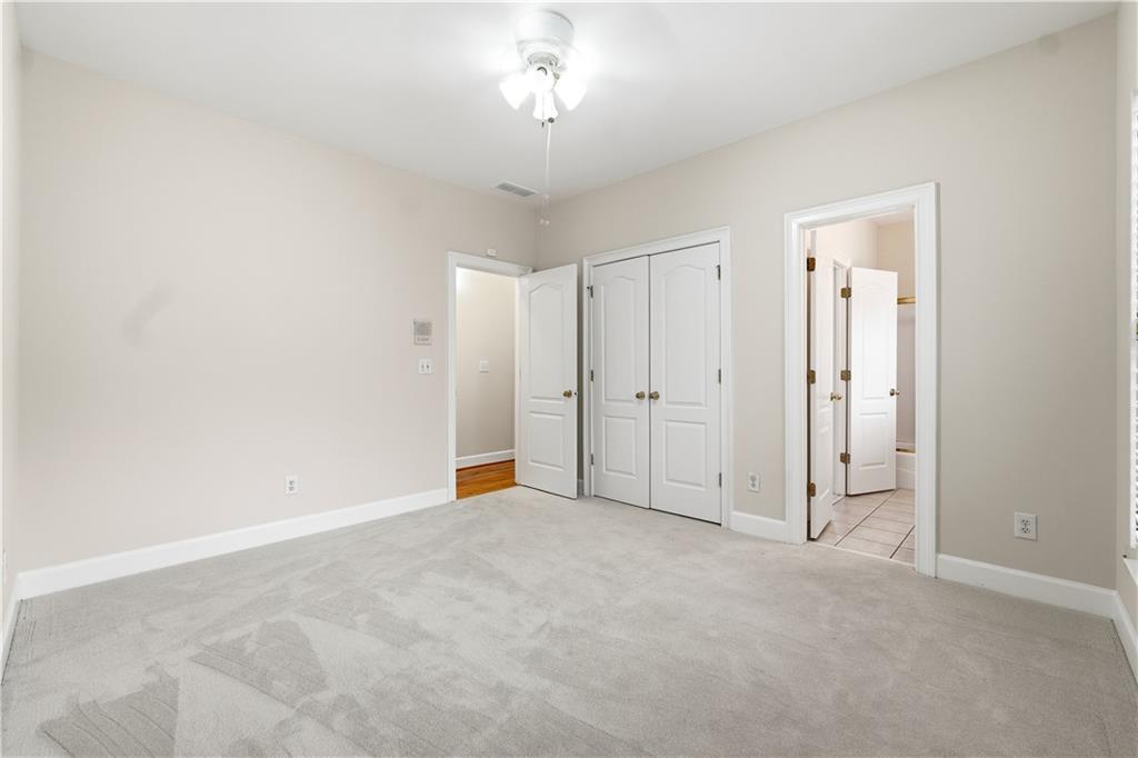 3051 Glenview Lane Monroe, GA 30656 - Photo 20 of 44 an empty room with a bathroom