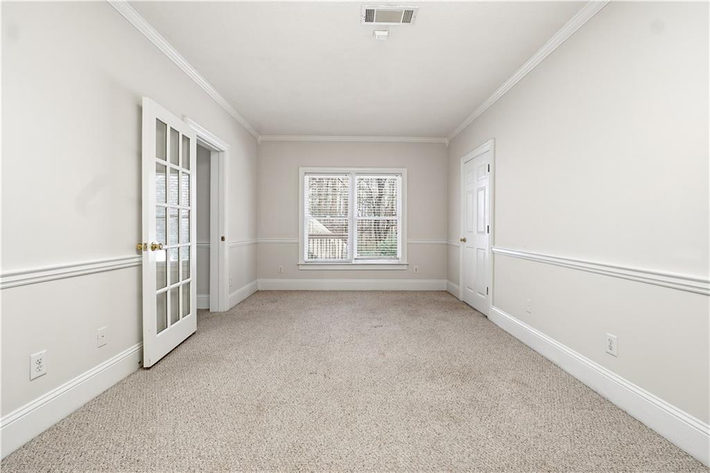 3051 Glenview Lane Monroe, GA 30656 - Photo 28 of 44 an empty room with windows