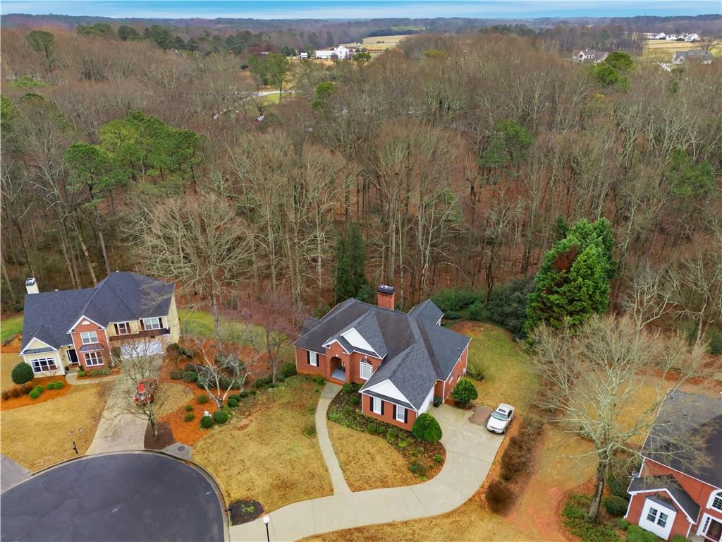 3051 Glenview Lane Monroe, GA 30656 - Photo 35 of 44 aerial view of a house with swimming pool and mountain view