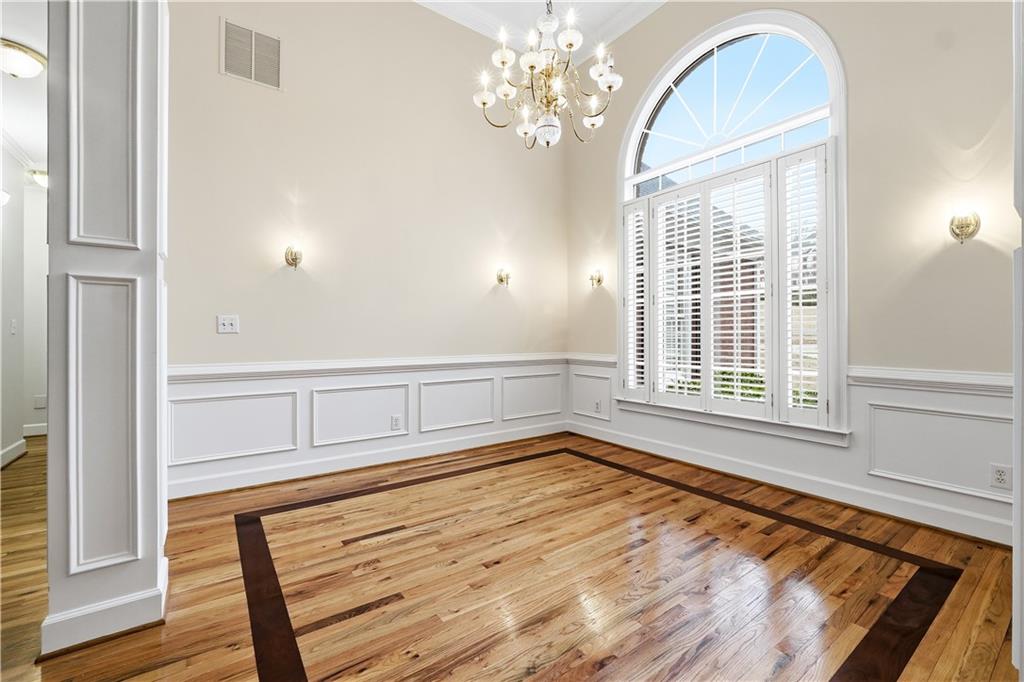 3051 Glenview Lane Monroe, GA 30656 - Photo 6 of 44 a view of empty room with wooden floor and fan