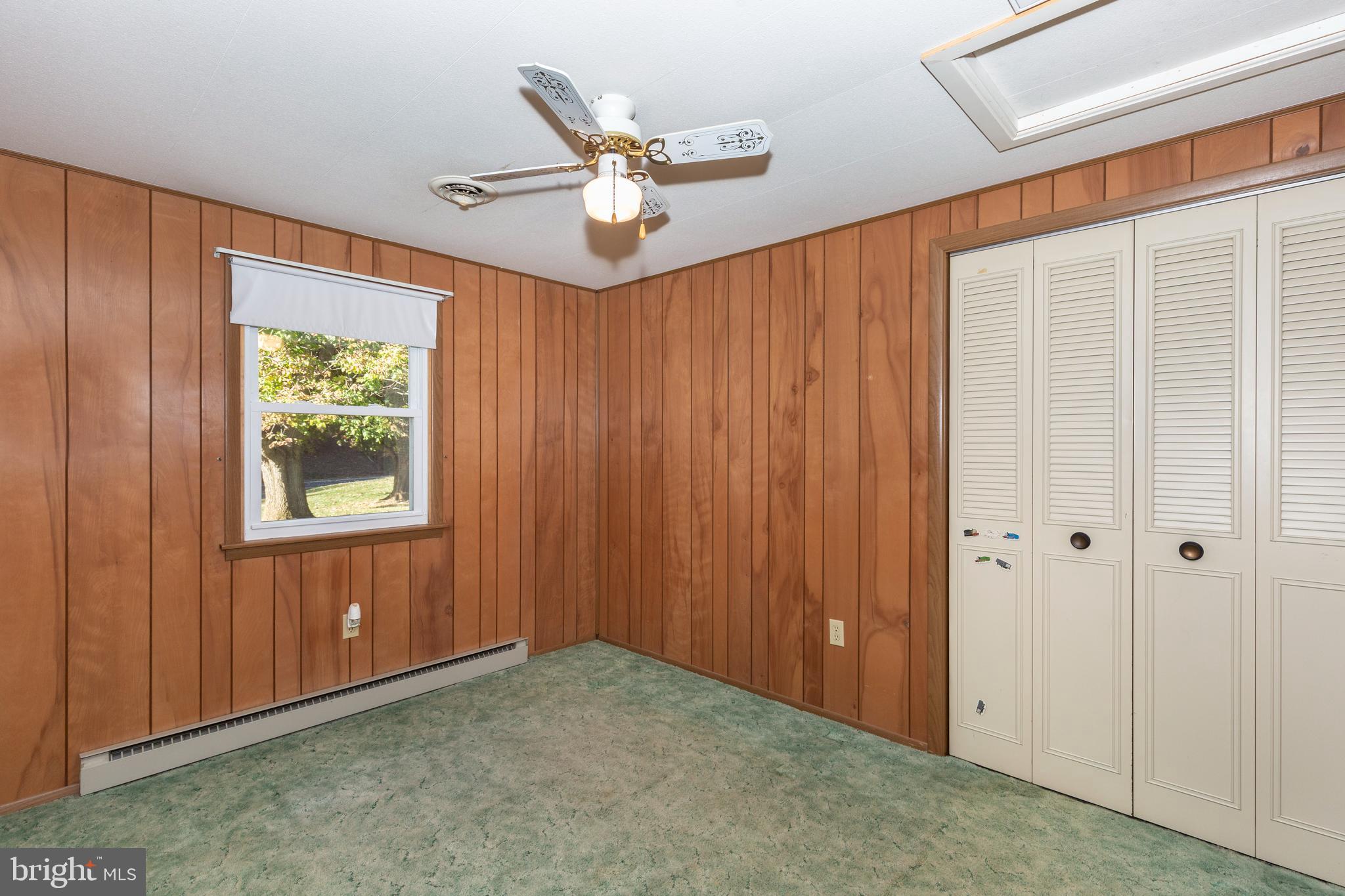3830 Watson Lane Union Bridge, MD 21791 - Photo 20 of 37 an empty room with ceiling fan and window