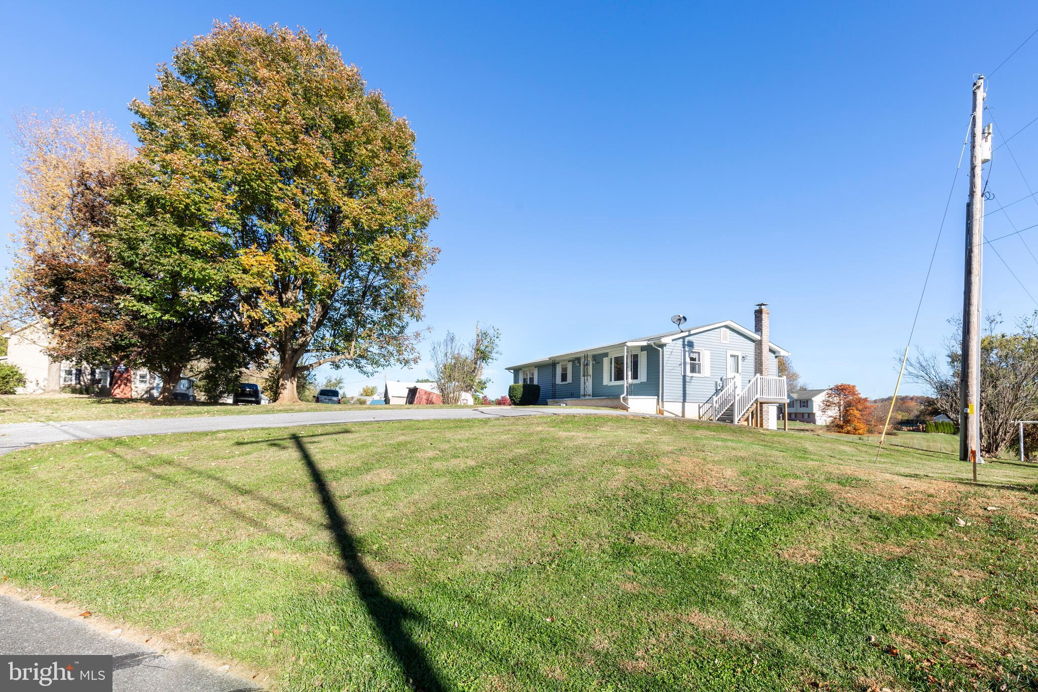 3830 Watson Lane Union Bridge, MD 21791 - Photo 34 of 37 a view of a big room with a big yard and large trees