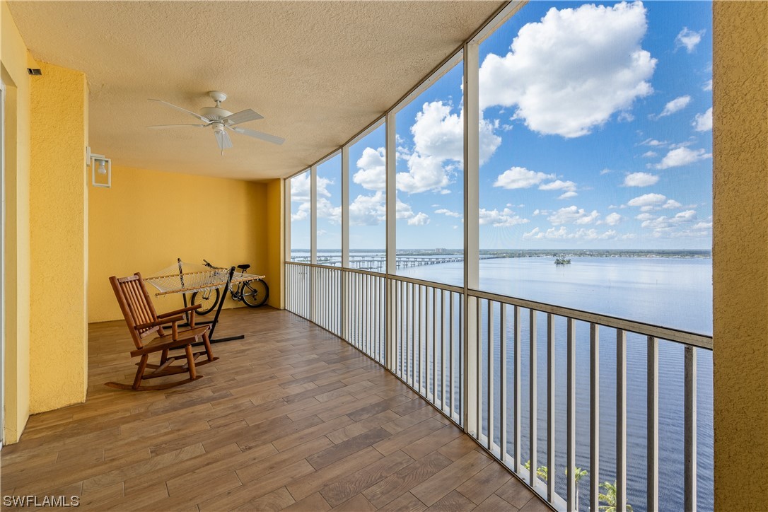 a view of a balcony with chairs