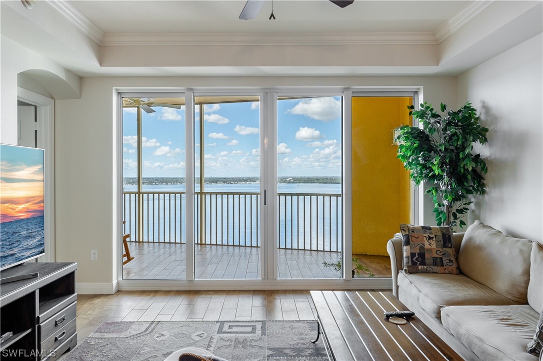 2743 First Street, Unit 1604 Fort Myers, FL 33916 - Photo 18 of 41 a view of a livingroom with furniture and a window