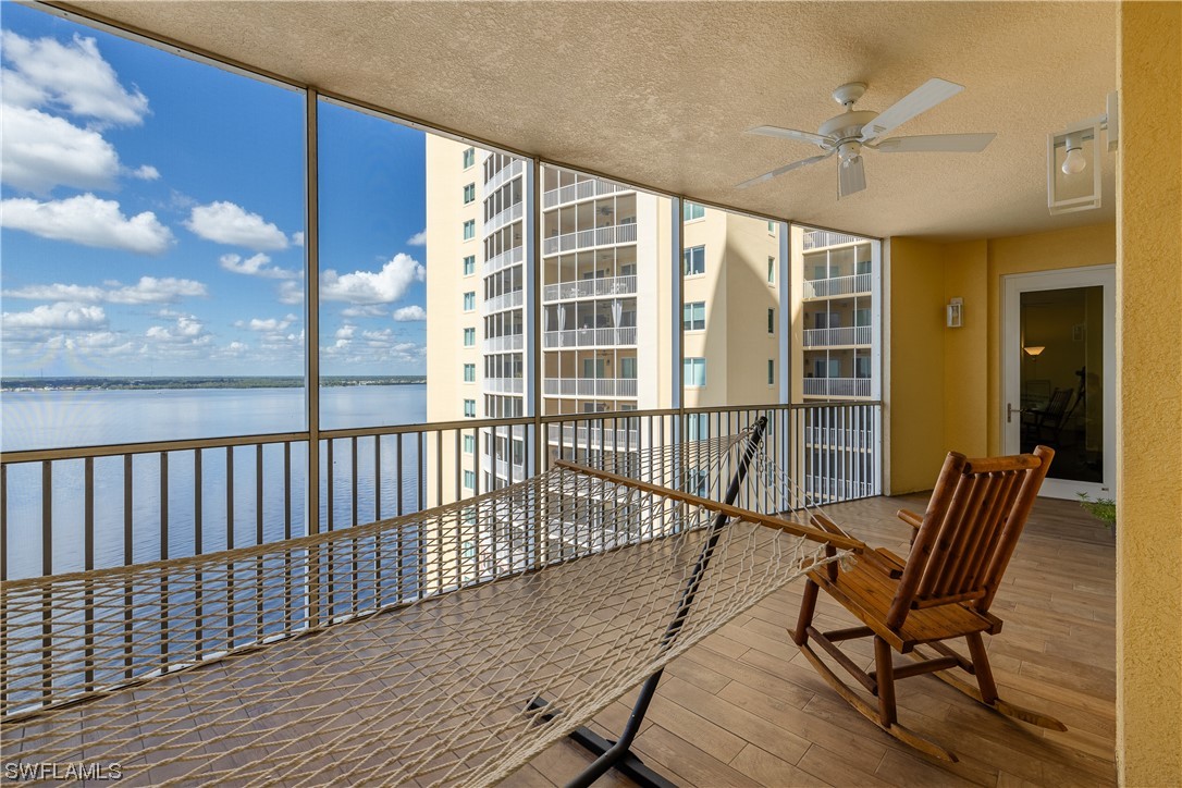2743 First Street, Unit 1604 Fort Myers, FL 33916 - Photo 20 of 41 a view of a balcony with chair and table