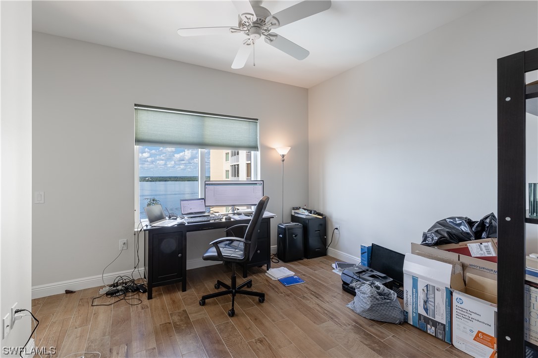 2743 First Street, Unit 1604 Fort Myers, FL 33916 - Photo 34 of 41 a view of a workspace with furniture and a window