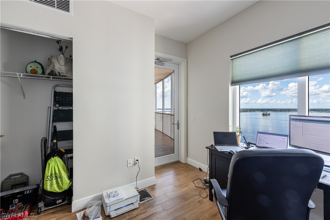 2743 First Street, Unit 1604 Fort Myers, FL 33916 - Photo 35 of 41 a living room with furniture and a window
