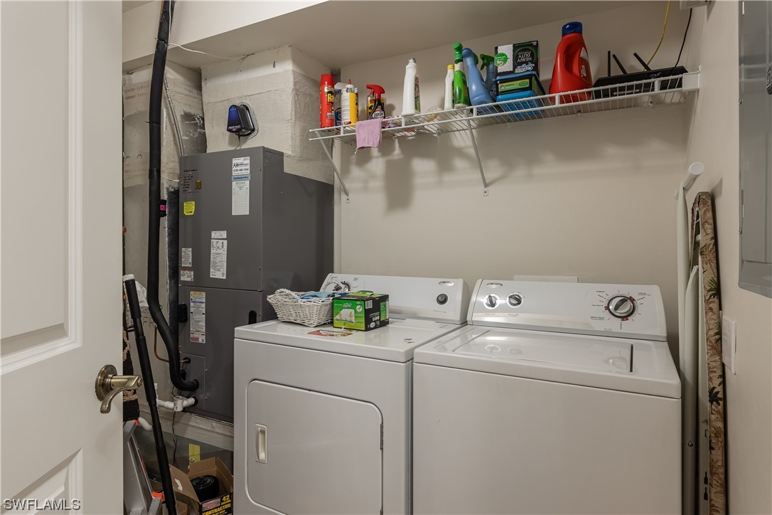 2743 First Street, Unit 1604 Fort Myers, FL 33916 - Photo 37 of 41 a utility room with dryer and washer