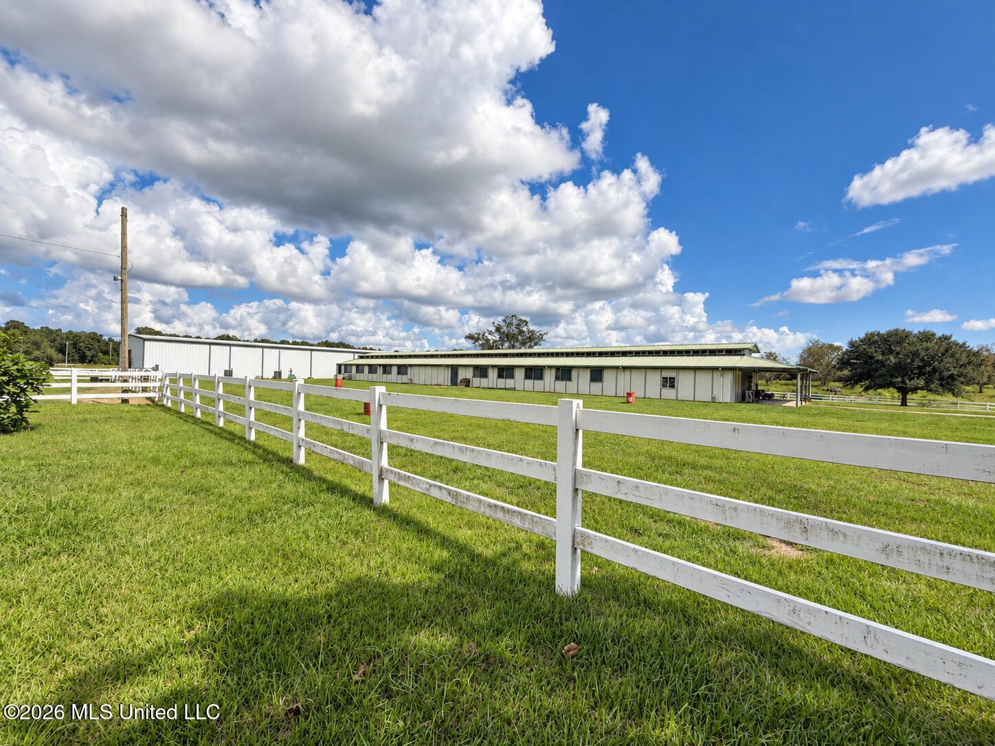 11450 County Farm Road Gulfport, MS 39503 - Photo 82 of 84 Sunlit equestrian stable and pasture