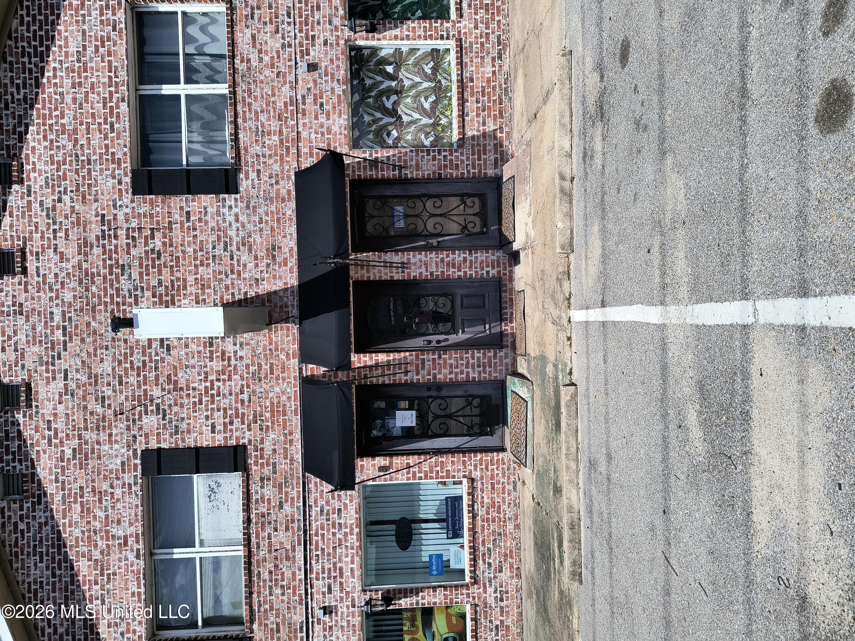 1956 East Pass Road, Unit B Gulfport, MS 39507 - Photo 1 of 12 Front