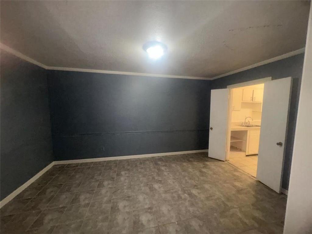 85 Place Fontaine Lithonia, GA 30038 - Photo 2 of 11 en empty room with windows