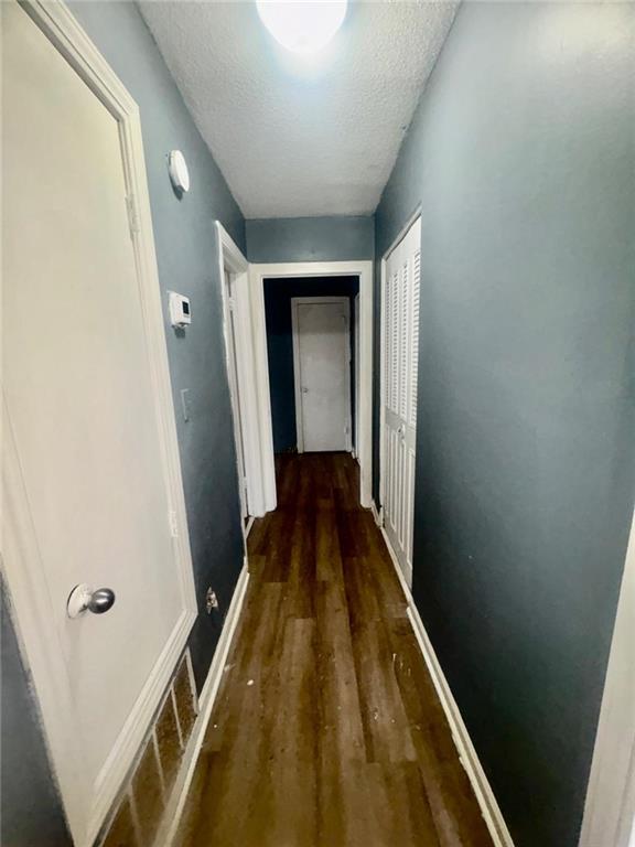 85 Place Fontaine Lithonia, GA 30038 - Photo 4 of 11 a view of a hallway with wooden floor and a hallway