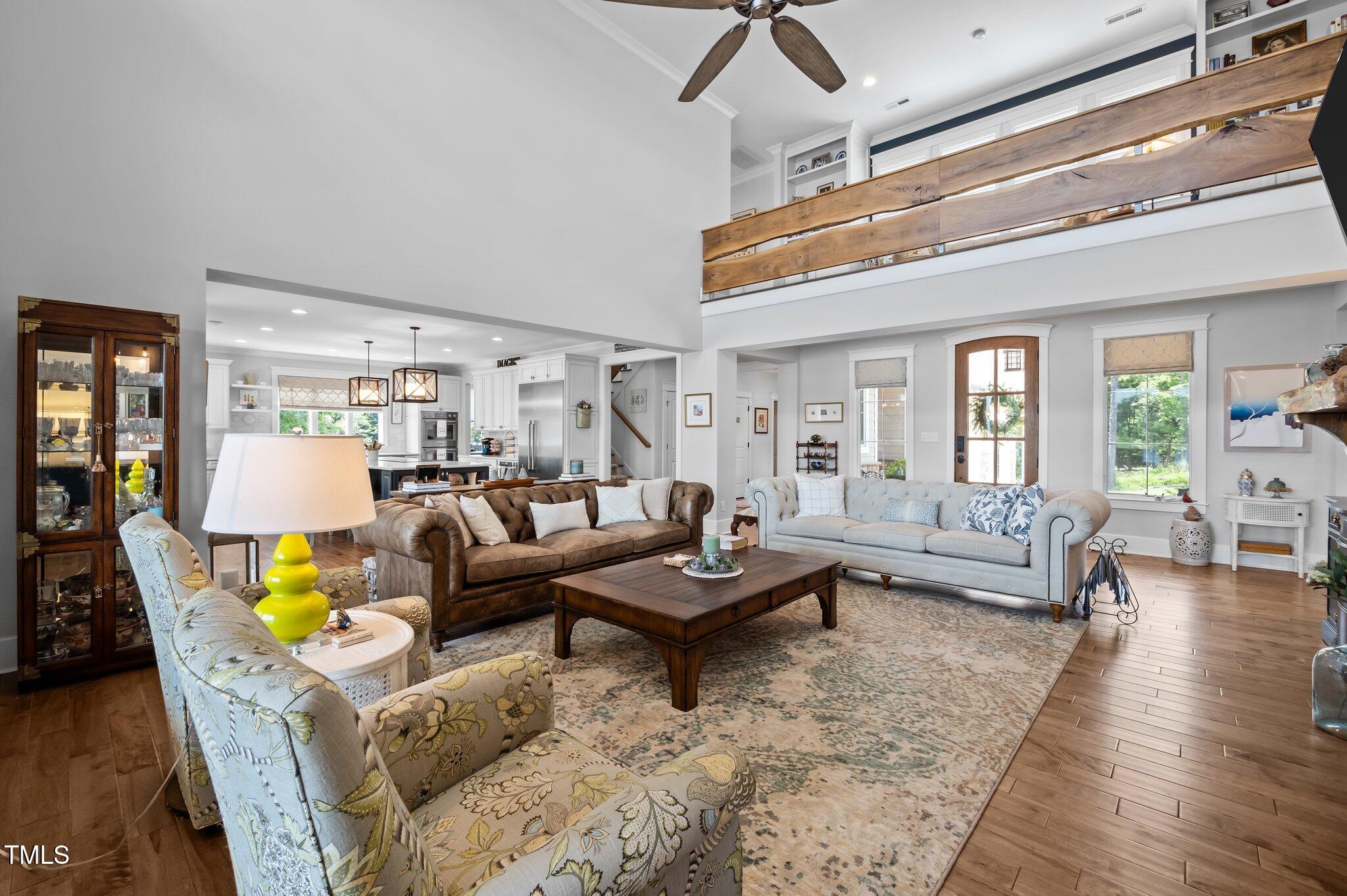 976 Estate Road Semora, NC 27343 - Photo 18 of 69 a living room with furniture and wooden floor
