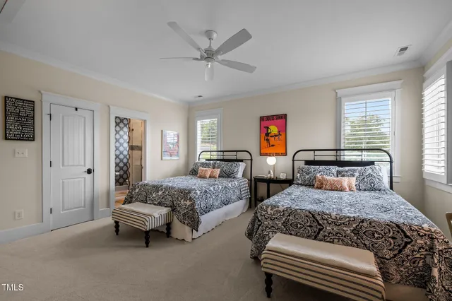 a view of a lake with a house in the background