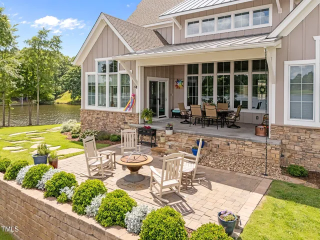 a front view of house with outdoor seating