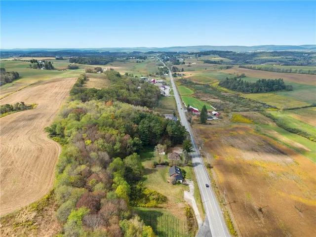 a view of an ocean and city