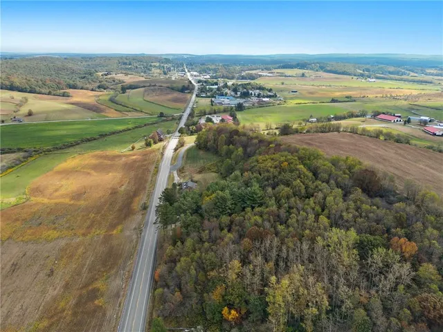 a view of an ocean and city