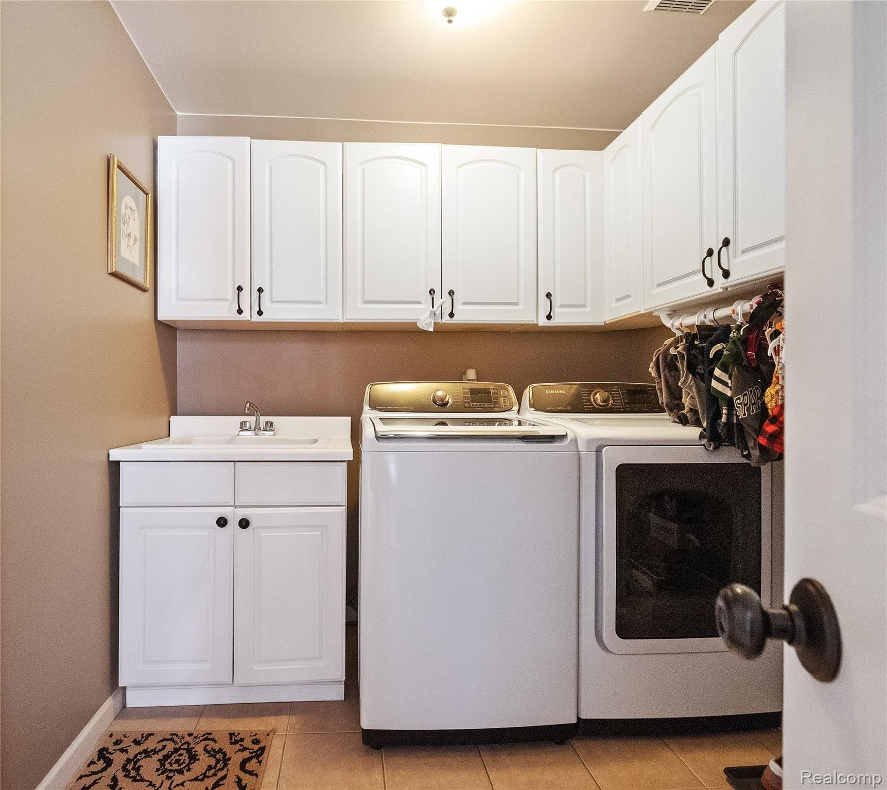 24417 Woodham Road Novi, MI 48374 - Photo 22 of 37 LAUNDRY/MUD ROOM OFF GARAGE