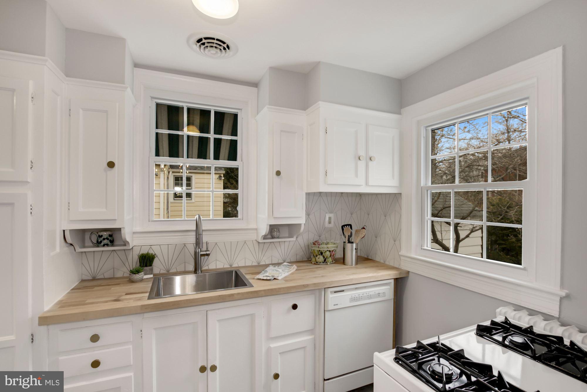 801 Violet Place Silver Spring, MD 20910 - Photo 13 of 35 Kitchen with new butcher block and backsplash