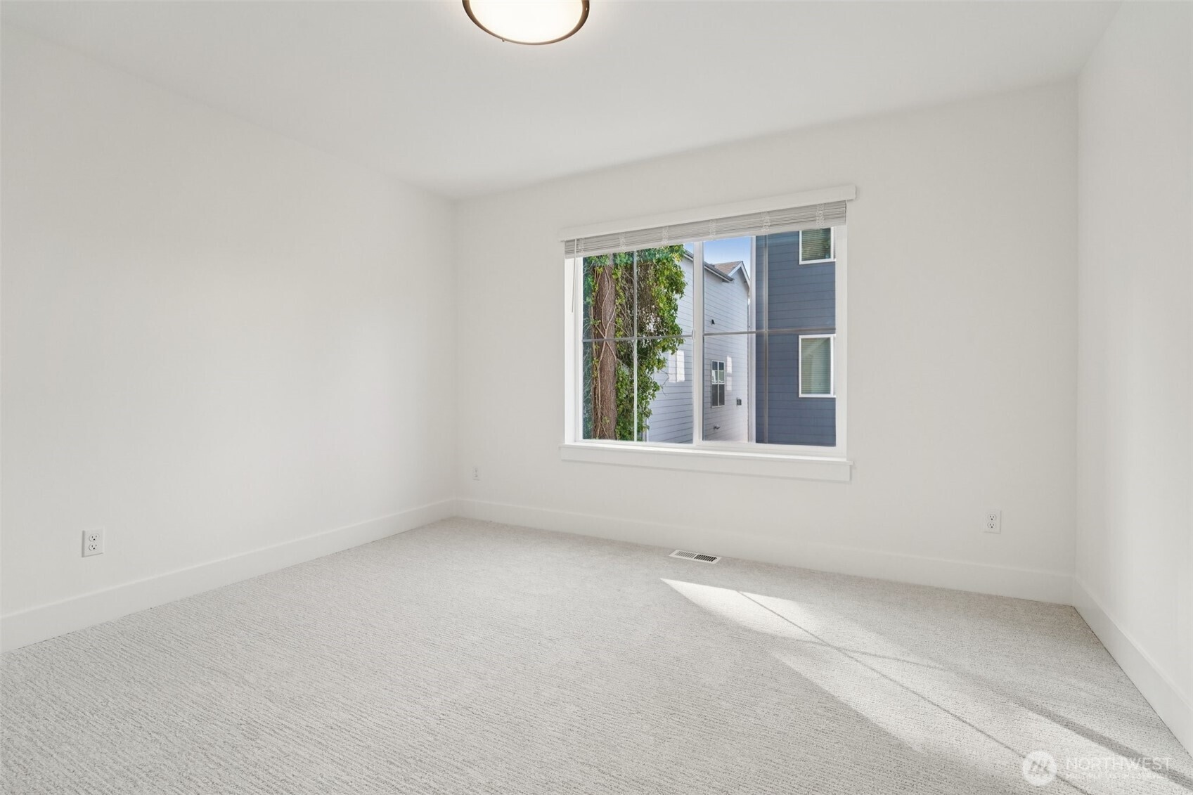8014 222nd Street Southwest Edmonds, WA 98026 - Photo 23 of 29 an empty room with a window