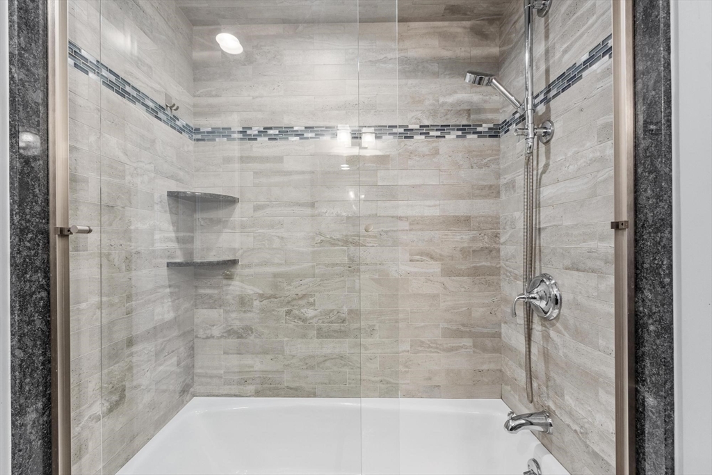 97 Hartwell Road Bedford, MA 01730 - Photo 11 of 42 a bathroom with a shower