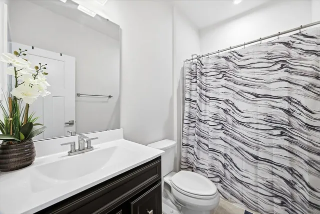 a bathroom with a sink and a toilet