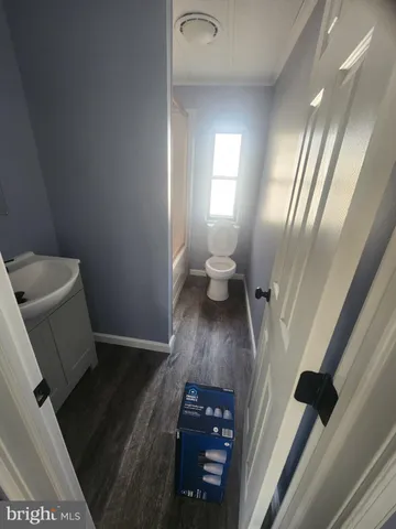 a view of living room with furniture and window