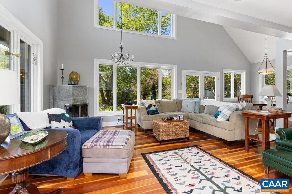 132 Reeds Gap Road Lyndhurst, VA 22952 - Photo 11 of 74 a living room with furniture fireplace and a large window