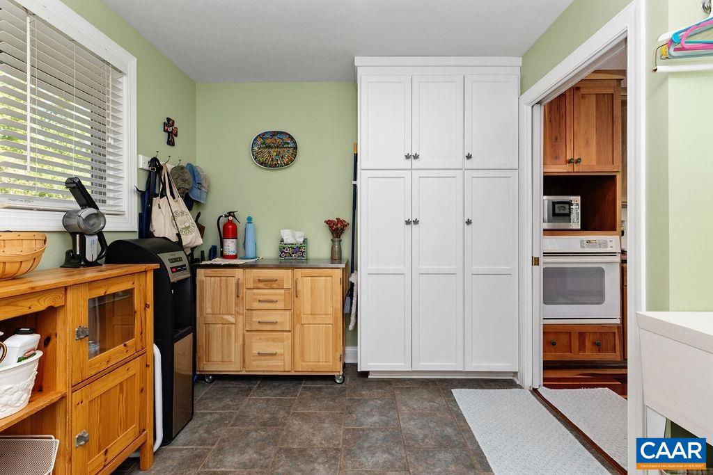 132 Reeds Gap Road Lyndhurst, VA 22952 - Photo 26 of 74 a kitchen with stainless steel appliances a refrigerator sink and cabinets