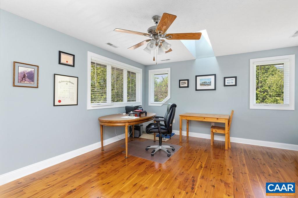 132 Reeds Gap Road Lyndhurst, VA 22952 - Photo 42 of 74 a view of a workspace with furniture window and wooden floor