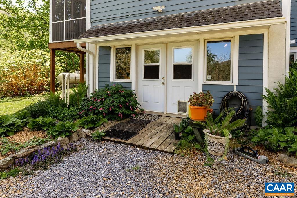 132 Reeds Gap Road Lyndhurst, VA 22952 - Photo 52 of 74 a front view of a house with outdoor seating and plants
