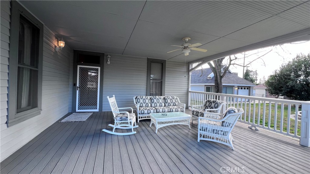 6375 Murphy Avenue Laton, CA 93242 - Photo 29 of 40 a view of a patio with dining table and chairs with wooden floor