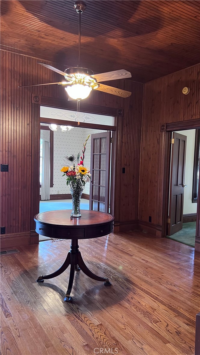 6375 Murphy Avenue Laton, CA 93242 - Photo 5 of 40 a view of a room with wooden floor table and chairs