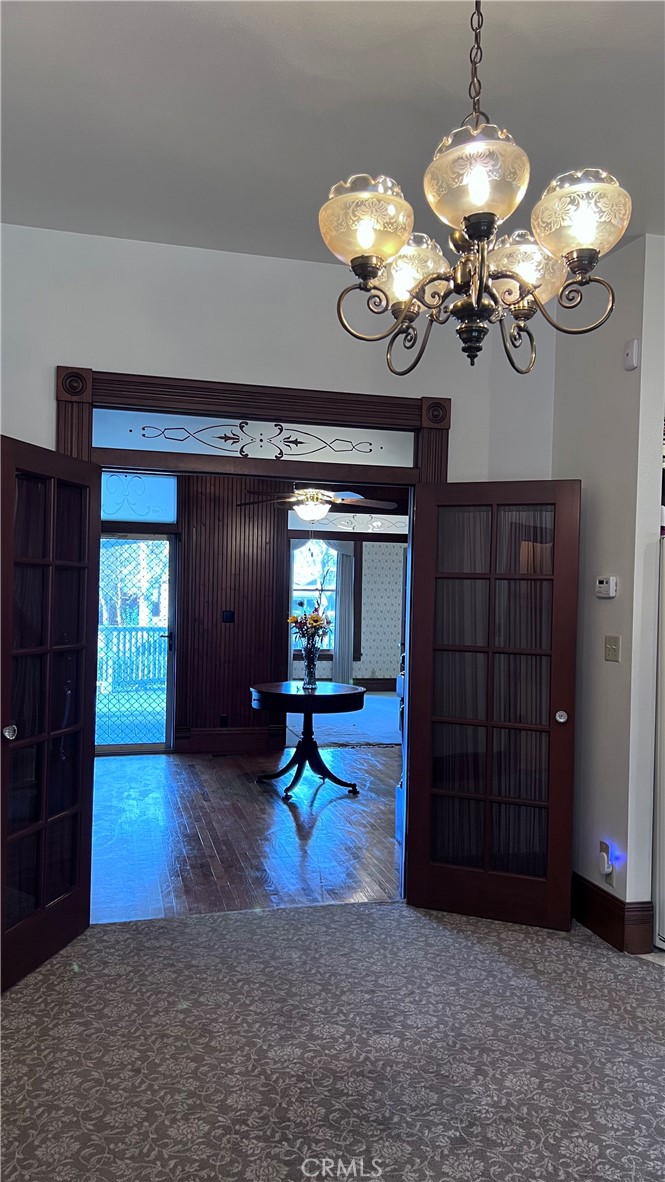 6375 Murphy Avenue Laton, CA 93242 - Photo 6 of 40 a view of a dining room with furniture and chandelier