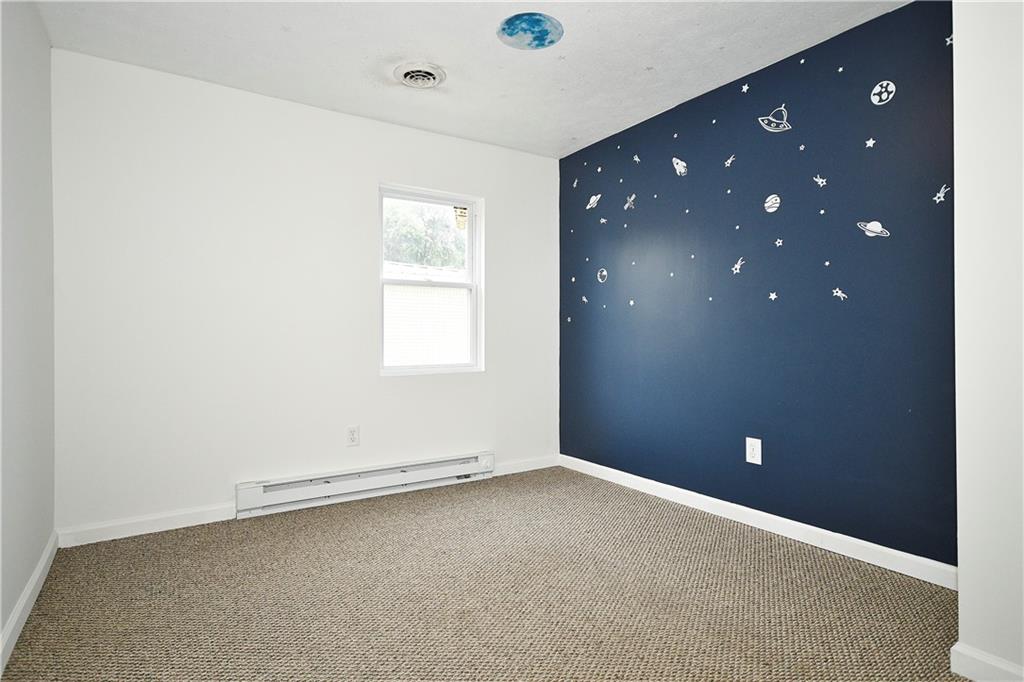 66 Chestnut Street Ellsworth, PA 15331 - Photo 21 of 28 a view of an empty room with a window