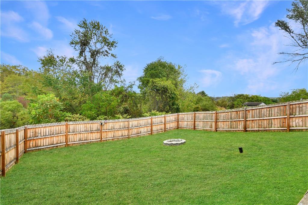 66 Chestnut Street Ellsworth, PA 15331 - Photo 3 of 28 a view of a backyard with a garden